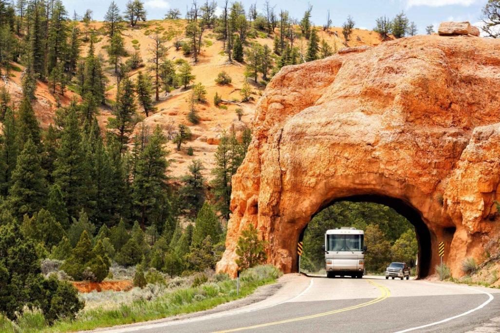 RV Going through a narrow mountain tunnel  