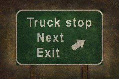 "Truck Stop Next Exit" sign